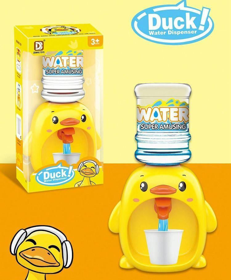 Yellow duck-shaped water dispenser with packaging and a cartoon duck on a yellow background