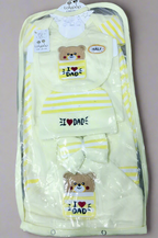 Packaged baby outfit with 'I love Dad' text and bear designs.